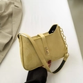 Retro yellow suede shoulder bag with gold chain strap and metal clasp detail - Yellow