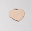 Polierter Herzanhänger aus roségoldenem Edelstahl mit einer glatten Spiegeloberfläche - Roségold