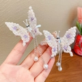 Silver butterfly hair clips with white pearls, purple flowers, and tassel pendants - Silver Butterfly 1 Pair