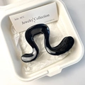 Pinza de pelo negra brillante de acetato en forma de onda para coleta alta - Mediano / Negro Brillante Ondulado
