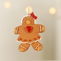 Gingerbread girl Christmas ornament with red bow and heart on creamy background - Type A-Heart Gingerbread Man