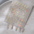 Detail of 3D embossed tulip nail stickers with gold foil lines and floral patterns - Tulip Floral (CO-410)