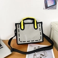 Graue 2D-Comic-Stil Canvas Tragetasche mit gelben Griffen und schwarzem Gurt im 2026 Design - Grau