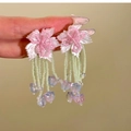 Detail of pink resin flower earrings with colorful beaded fringe held by hand - 16# 925 Sterling Silver Earring Post - Pink/Green - Seed Bead Crystal Flower Tassel Earrings