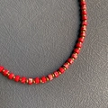 Handmade necklace featuring red textured stone beads and gold metal spacers in detail - 12#