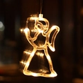 Warm yellow LED star angel light decoration for window display and holiday festive ambiance - Angel