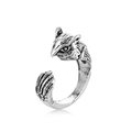 Close-up of vintage owl ring details showing antique silver owl head and eagle claws - Retro Owl