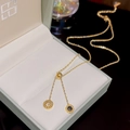 18K gold titanium steel necklace featuring a Roman numeral pendant in a gray jewelry box - X417 Roman Numerals Black White