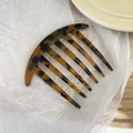 Classic tortoise shell hair comb with seven teeth design for elegant women's styling - Tortoise
