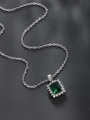 Macro shot of an elegant square emerald pendant necklace with a sparkling diamond halo - Pendant (Without Chain) / White Plated Emerald Green