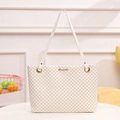 Borsa tote bianca con pois gialli e placca logo in metallo dorato sul davanti - Bianco