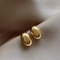 Sleek 18K gold-plated oval hoop earrings with a mirror-polished finish on silk fabric - E5655 Gold Mirror Oval