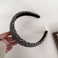 Detail of classic black and white tweed sponge headband with woven texture and thick design - Black & White Houndstooth