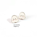 Detail of wooden ghost earrings with pink cheeks and natural wood grain texture - Ghost