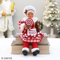 Close-up of a Christmas chef doll in red plaid dress holding a candy and wreath - Mrs. Claus Chef/Sitting/31cm