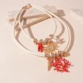 Detail of layered leather cord necklace with sea-themed charms like coral and sun - Gold (Two-piece Set)