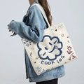Off-white canvas shoulder bag with blue cartoon cloud and artistic graffiti prints - Sunflower - Beige