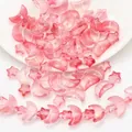 Macro view of pink gradient moon and star glass beads for DIY jewelry making - Golden Pink Gradient