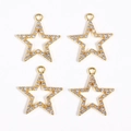 Macro detail of four gold-plated star pendants with pavé-set cubic zirconia stones - Gold Five-pointed Star