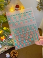 Detailed close-up of YT3736 Christmas nail stickers with reindeer and snowflake patterns - Embossed YT3736 (Red Green White Xmas)