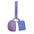 Detail of lavender wristlet set showing round pouch and rectangular nylon mini bag - Purple + Purple