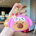 Pink cartoon My Melody inspired silicone keychain with 3D flower and golden ring - My Melody Capy Purse