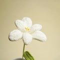 Handcrafted white crochet tulip flower with yellow stamen and green leaf - White