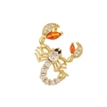 Golden scorpion pendant with orange zircon claws and clear stones on white background - Colored Scorpion