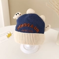 Detail of winter dinosaur knitted hat with textured embroidery and plush back ridges - 3-6 Years / Blue