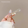 Elegant gold hair claw clip with white cat-eye stones and crystal butterfly design - Opal Bowknot Side Clip (Rhinestone Version)