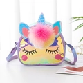Close-up of laser TPU unicorn crossbody bag with large pom-pom and adjustable strap - Light Purple