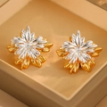 Macro shot of two-tone flower stud earrings with gold and silver metal petals in a box - Color Contrast Metal Flower Two-Way Earrings