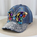 Detail of denim baseball cap featuring colorful gemstone butterfly and rhinestone brim - No.10/Dark Blue Denim/Colorful Butterfly