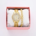 Macro view of gold iced-out watch and heart bracelet set inside a pink luxury gift box - Style 10 + Bracelet + Box