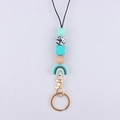 Detail of silicone beaded lanyard with mint rainbow charm and gold metal lobster clasp - Gray