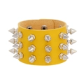 Close-up of yellow leather bracelet with three rows of silver cone spikes and snap button - Lemon Yellow