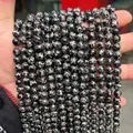 Polished synthetic snakeskin stone beads with black and white web patterns for DIY jewelry - Synthetic Black Imperial Jasper