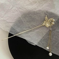 Elegant Chinese style golden butterfly hair pin with pearl tassel and hollowed wings - Butterfly Dance