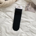 Gemütliche schwarze Strick-Stulpen-Socken aus gekämmter Baumwolle mit gerippter Textur - Einheitsgröße / Schwarz