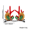 Cute Christmas antler hair clips with red berries and green sequin leaves on white background - Gem Green Leaf Red Antler
