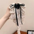 Elegant floral mesh hair claw clip with black ribbon bow in a sweet cream finish - White Orange Floral-Claw Clip