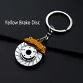 Car brake disc and yellow caliper keychain pendant in polished metal finish - Yellow Brake Disc