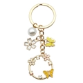 Golden keychain with pink enamel flowers, white pearls, and sparkling butterfly pendants - Yellow Butterfly Flower (ER698)
