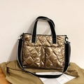 Gold quilted down shoulder bag with dual pockets and adjustable black webbed strap - Champagne