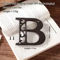 Industrieller Wanddekor aus schwarzem Gusseisen Buchstabe B mit dekorativem Rankwerk - Holer Buchstabe B