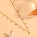Gold-plated necklace featuring crescent moon pendants and sparkling round rhinestones - Moon with Stone (K702)