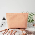 Seersucker cosmetic bag in orange and white vertical stripes for travel storage - Orange Stripes