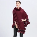 Elegant wine red knit poncho with faux rabbit fur collar and playful pom-pom fringe - One Size / Burgundy