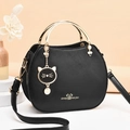 Fashionable black cat shell crossbody bag with golden hardware and metal handle - Black