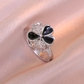 Macro detail of silver four-leaf clover ring with black inlay and sparkling zircon crystals - Silver Black Flower Clover Style (J0338-钢色-2) / Steel
